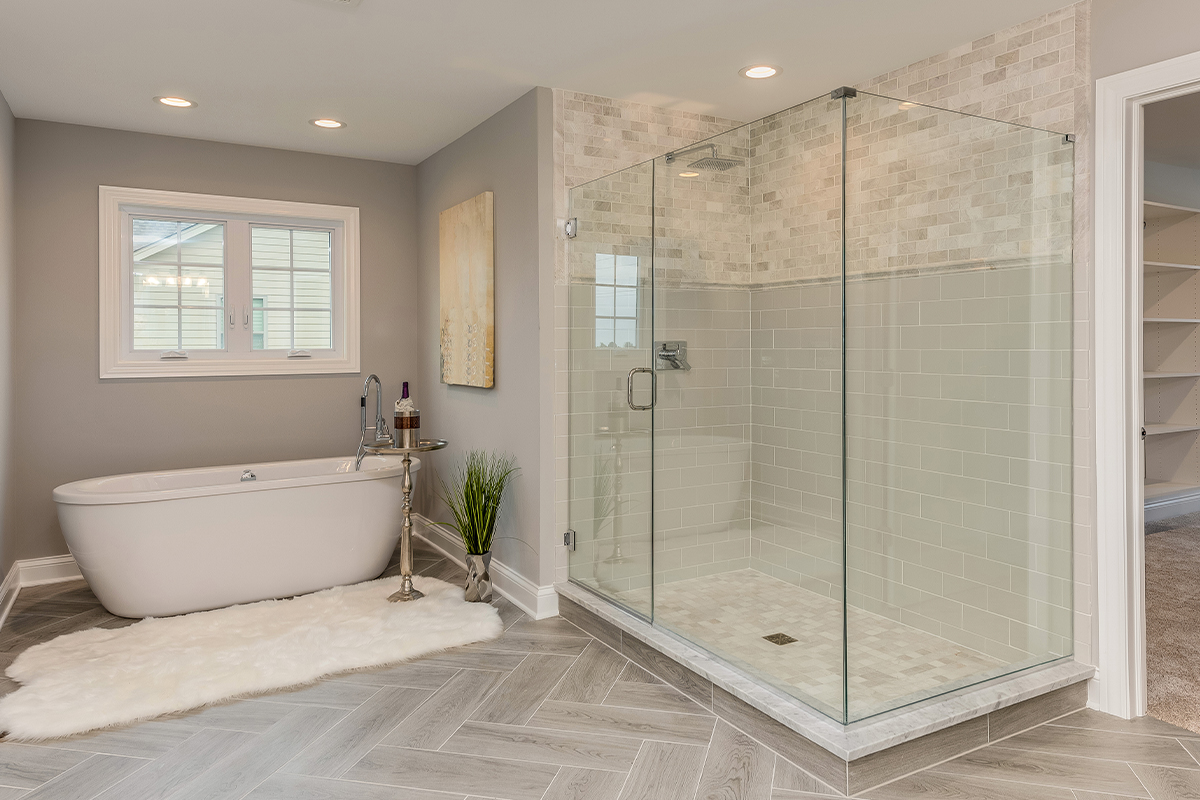 a bathroom showing a glass shower enclosure in Clearwater.